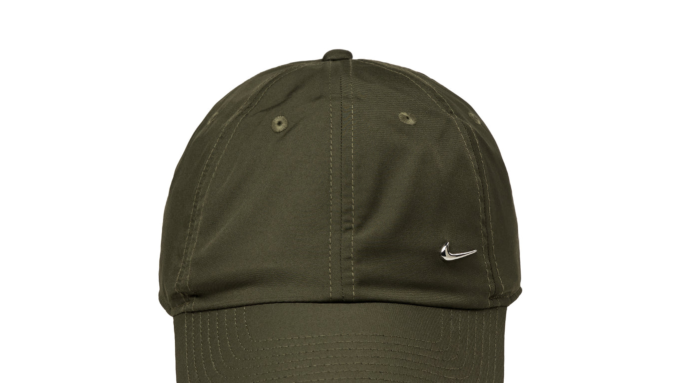 Nike Club Metal Swoosh buy now at Asphaltgold Online Store