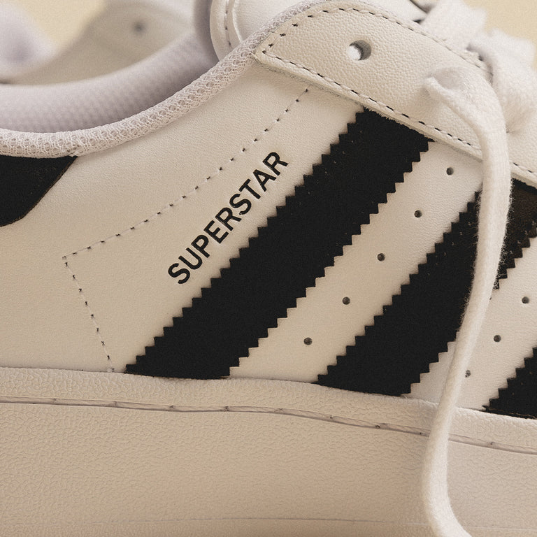 Adidas superstar black store and white fake