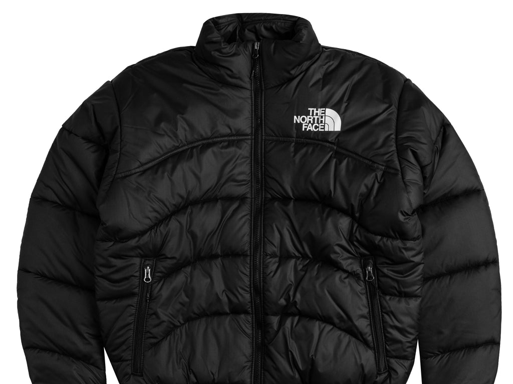 White and black north face puffer jacket on sale