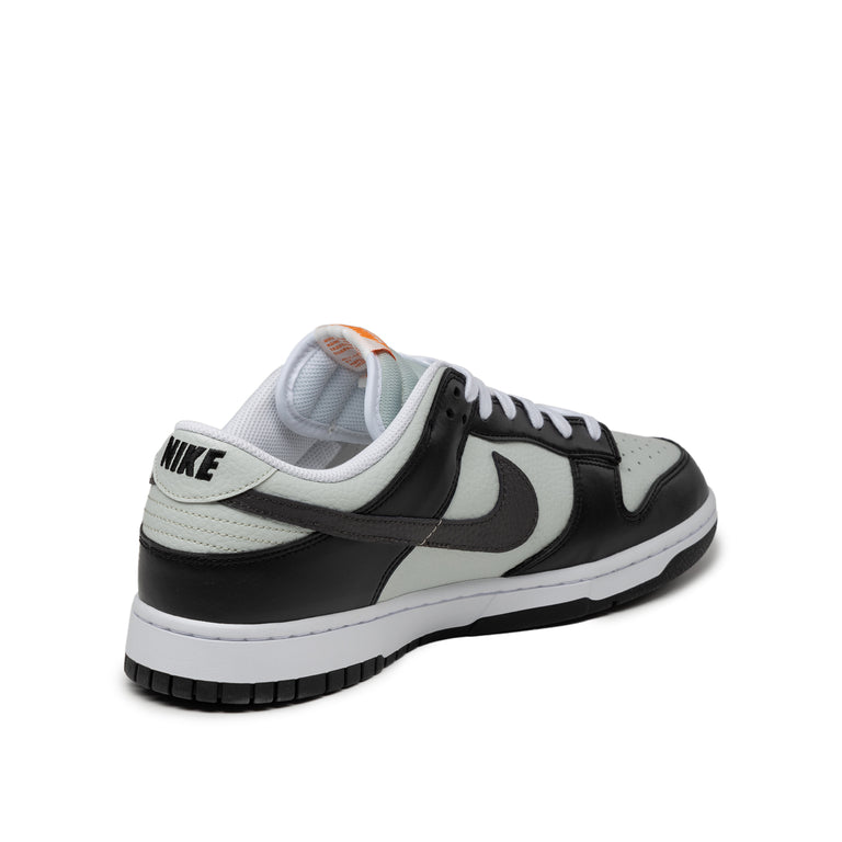 nike shoe with chrome swoosh black and grey color
