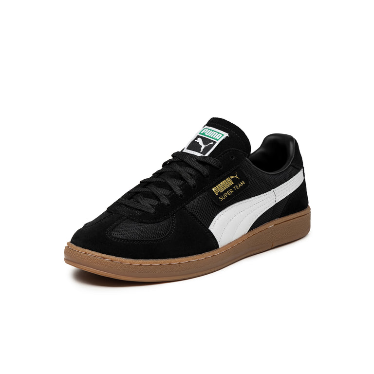Black puma shoes gum sole online