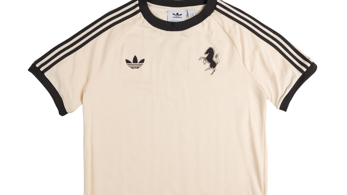 adidas the brand with the 3 stripes shirt