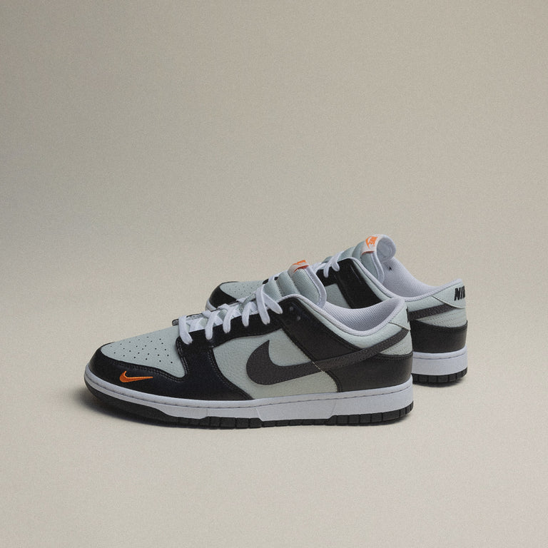 nike shoe with chrome swoosh black and grey color