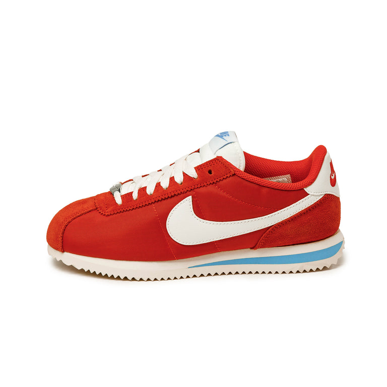 adc7a6d470de7b14d88f7178fa7cfdddae0fa2d7 DZ2795 601 Nike Wmns Cortez Picante Red Sail University Blue os 1 768x768