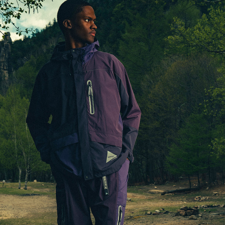 Gramicci x And Wander Patchwork Wind Hoodie onfeet