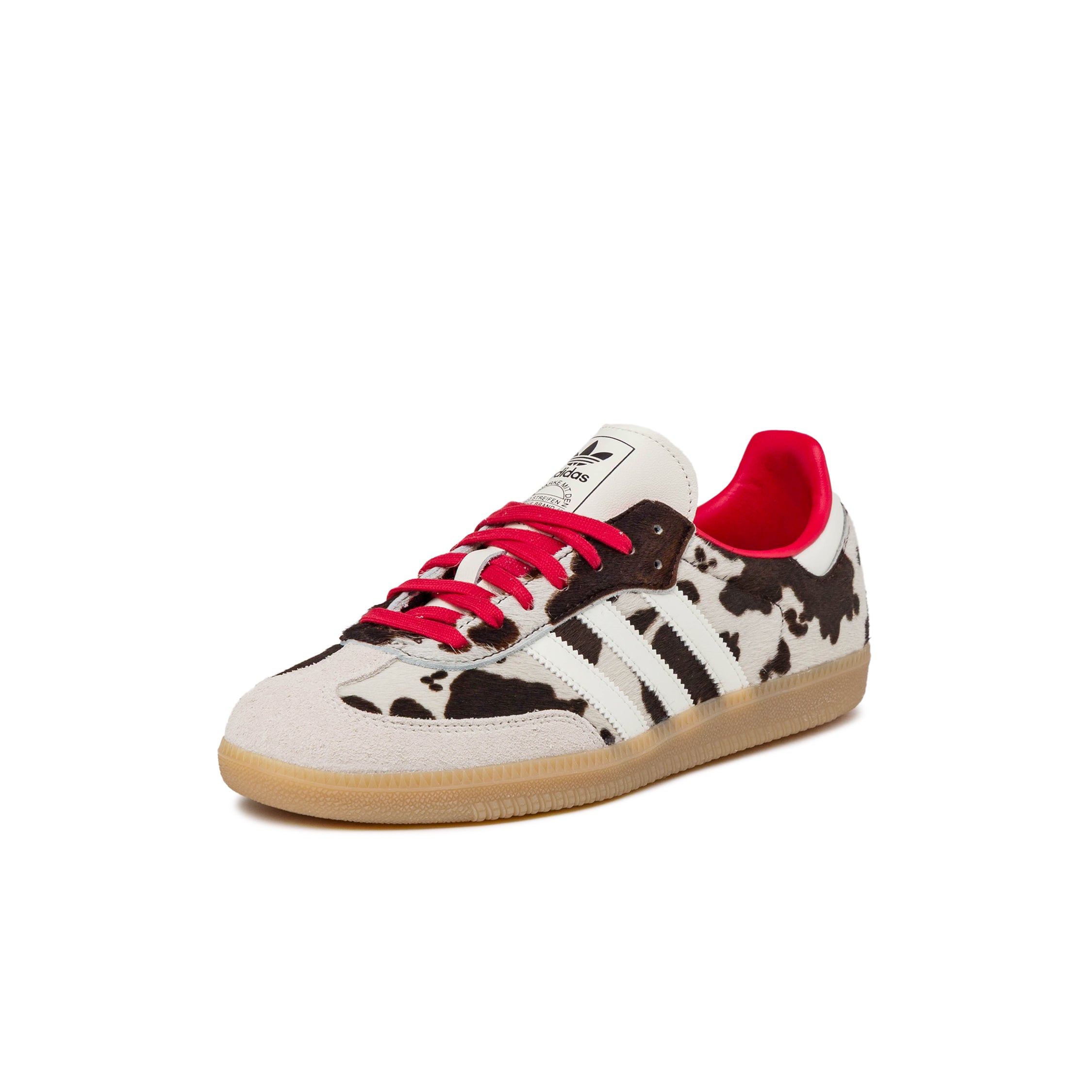 Adidas Samba OG sneakers in a bold, cow-print design, reflecting the unique style that some athletes might embody on and off the field