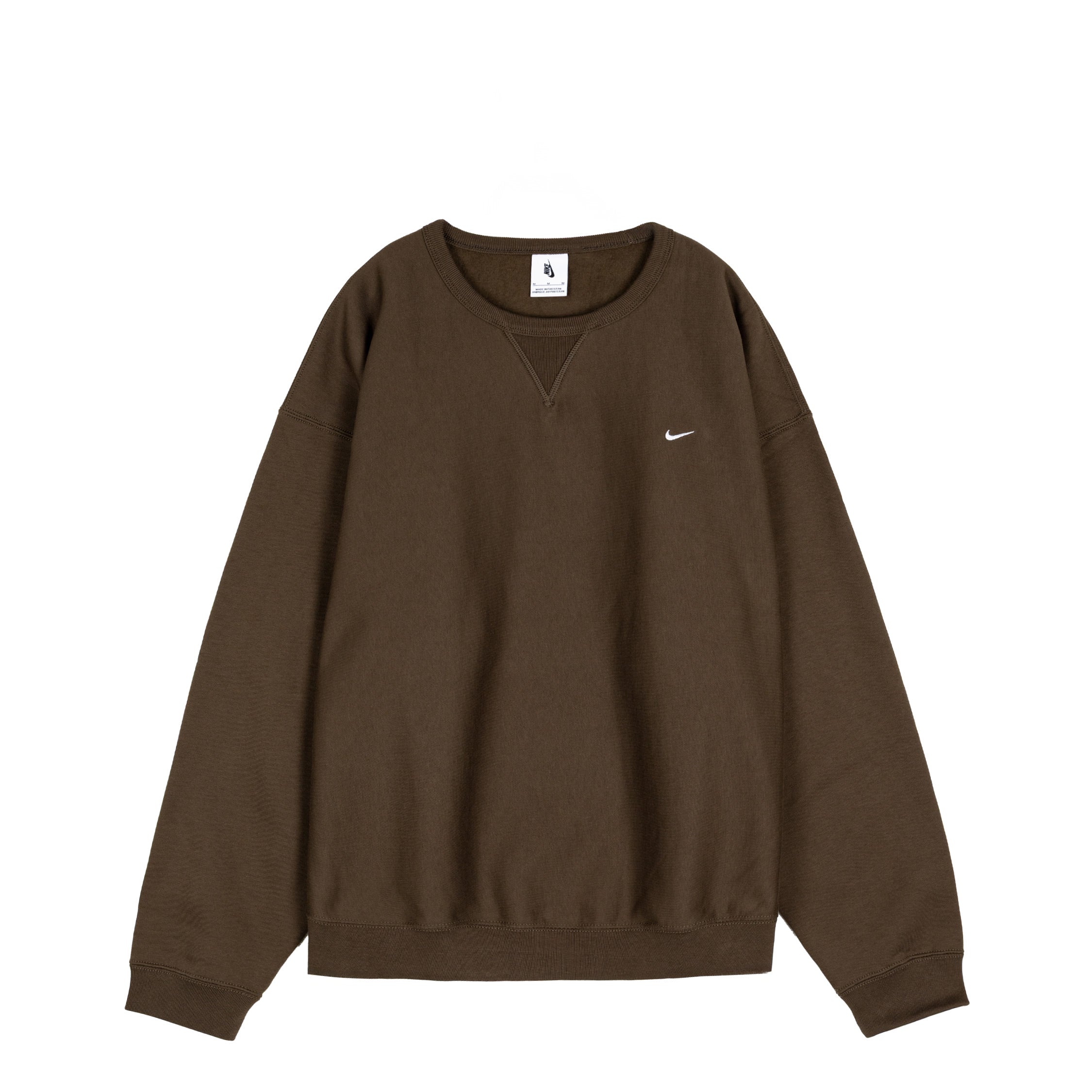 brown nike swoosh